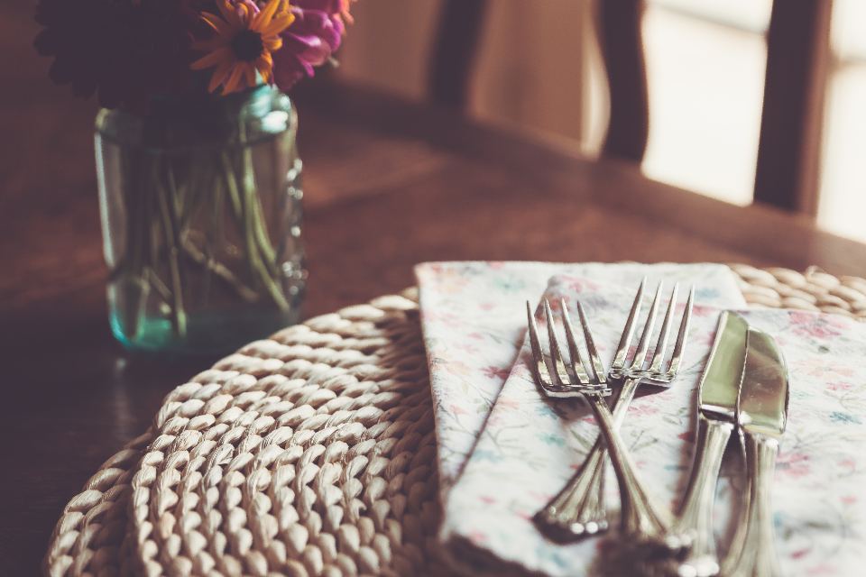 A set dinner table in the evening light